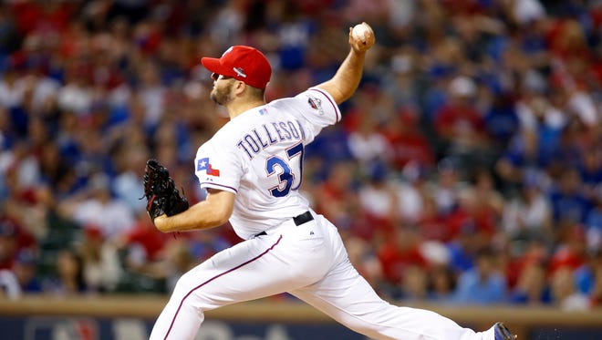 Texas Rangers relief pitcher Shawn Tolleson throws a pitch against the Toronto Blue Jays.