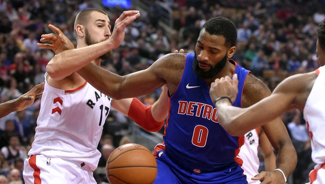 Jan 17, 2018; Toronto, Ontario, CAN;  Detroit Pistons center Andre Drummond (0) battles for the ball with Toronto Raptors center Jonas Valanciunas (17) in the first half at Air Canada Centre.
