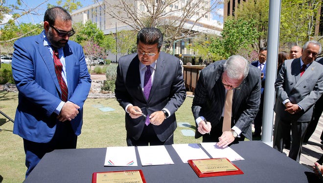 District 1 City Rep. Peter Svarzbein joins Juarez Mayor Armando Cabada and El Paso Mayor Dee Margo for the signing of The Sister Cities Agreement which was presented at the Joint Council meeting on October 30, 2017. The signing ratified the partnership between the two cities Tuesday afternoon at a ceremony held at San Jacinto Plaza.