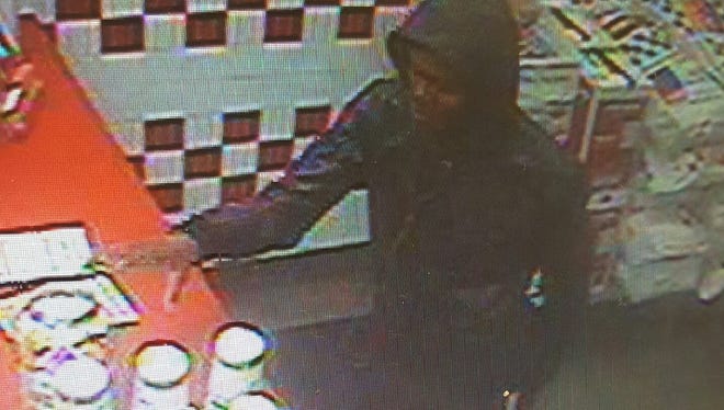 A petit-larceny suspect is shown in this image, image captured about 10:30 p.m. on Sunday from a surveillance camera at Five Guys Burger and Fries in South Burlington.