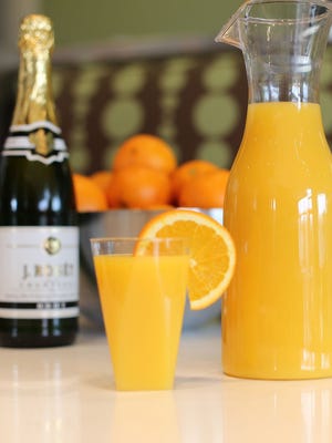 Come for the pancakes, stay for the Mimosas at Scramble, a Breakfast Joint.