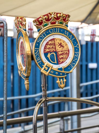 The Queen’s Royal Standard would fly from the bow of