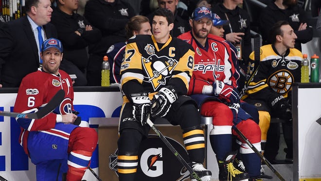Pittsburgh Penguins forward Sidney Crosby (87) sits next to Washington Capitals forward Alex Ovechkin (8) and Montreal Canadiens defenseman Shea Weber (6) during the skills challenge relay during the 2017 All-Star festivities.