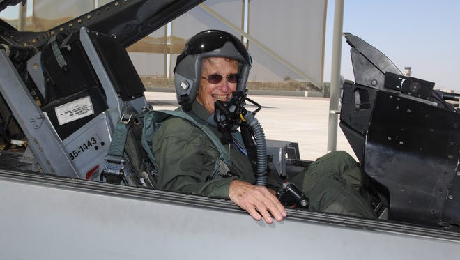 Betty Grenig gets a chance to sit in a F-16 jet at Luke Air Force Base for her 90th birthday.