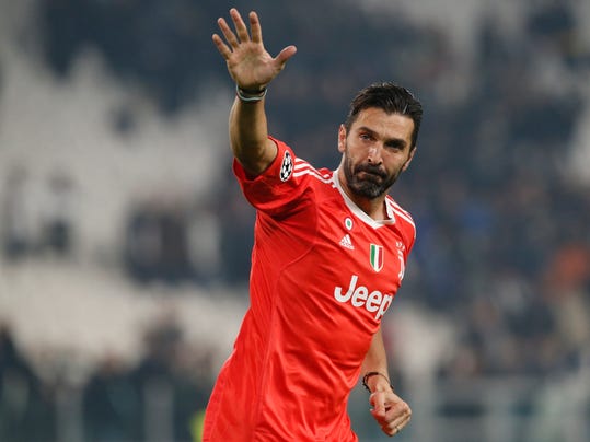 Juventus goalkeeper Gianluigi Buffon waves to fans at the end of the Champions League group D soccer match between Juventus and Barcelona, at the Allianz Stadium in Turin, Italy, Wednesday, Nov. 22, 2017. (AP Photo/Antonio Calanni)