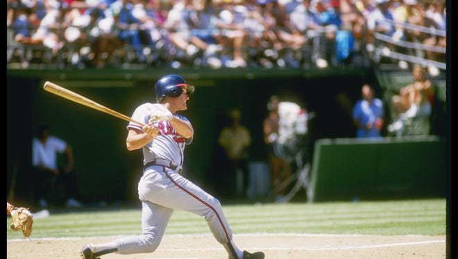 Third baseman Graig Nettles of the Atlanta Braves swings the bat.