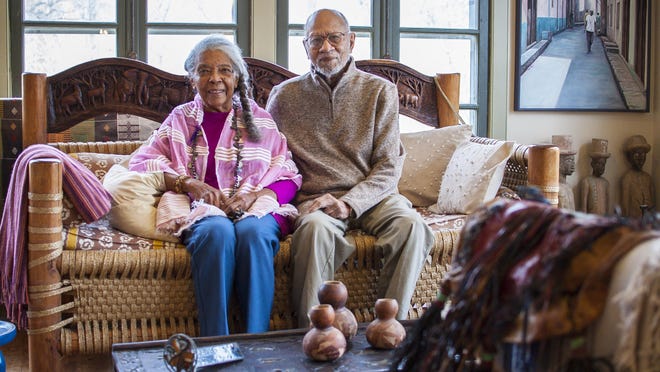Lydia Clemmons and Dr. Jackson Clemmons pose in the living room of their daughter Lydia's home at the family farm in Charlotte on Thursday, November 10, 2016. The property is being added to the Vermont African-American Heritage Trail. The younger Clemmons' home is full of African artifacts and furniture, may from Uganda.