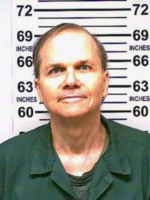 FILE - This Jan. 31, 2018 photo, provided by the New York State Department of Corrections, shows Mark David Chapman, the man who killed John Lennon outside his Manhattan apartment in 1980. Chapman said he was seeking glory and deserved the death penalty for the "despicable" act. Chapman made the comments in response to questions last month from a parole board, which denied him parole for an 11th time.