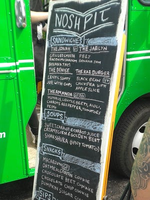 The menu board at Nosh Pit Detroit food truck.