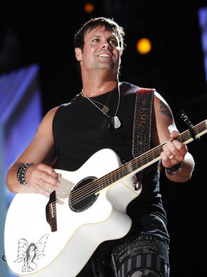 Troy Gentry of Montgomery Gentry performs during the CMA Music Festival at LP Field on June 14, 2009.