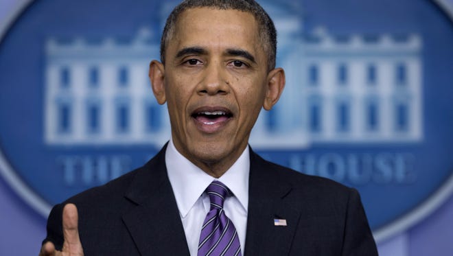 President Barack Obama speaks in the briefing room of the White House in April. A Rochester man has been charged with making threats against the president.