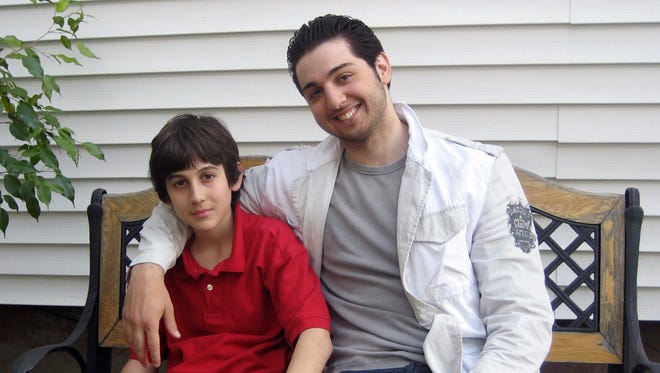 This undated photo released Wednesday, April 29, 2015, by the Federal Public Defender Office and presented as evidence during the penalty phase in the trial of Dzhokhar Tsarnaev in Boston, brothers Dzhokhar, left, and Tamerlan Tsarnaev sit together at an unknown location. Dzhokhar Tsarnaev was convicted of the Boston Marathon bombings that killed three and injured more than 260 spectators in April 2013. Tamerlan Tsarnaev died in a firefight with police days after the bombings. (AP Photo/Federal Public Defender Office)