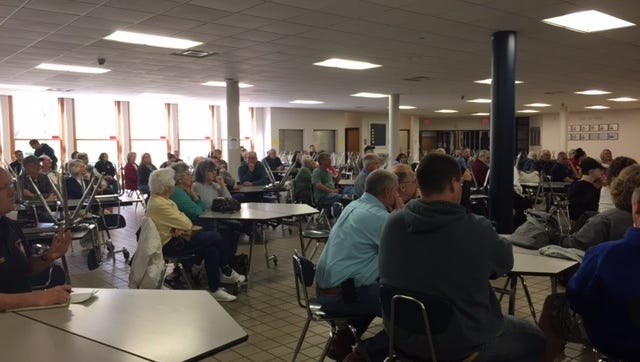 Several dozen Madison Township residents gathered for the board of trustees meeting at Licking Valley High School on Tuesday.