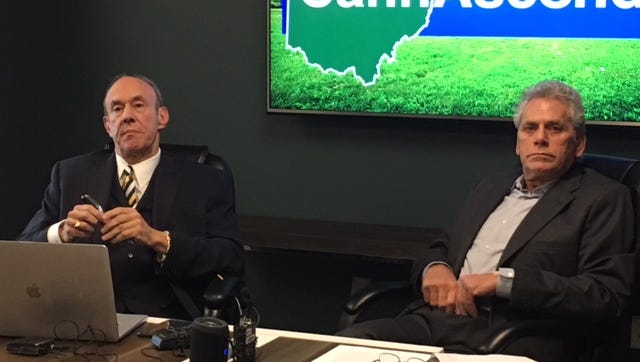 Jimmy Gould, right, founder of CannAscend Ohio and a member of his legal team.