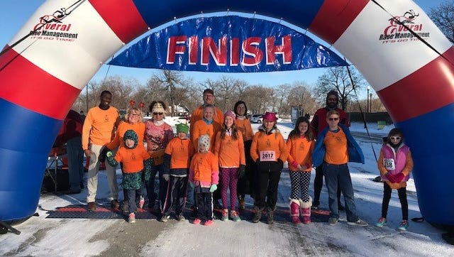 About 600 Metro Detroiters gathered on Sunday afternoon for Detroit’s New Year Eve fun run.