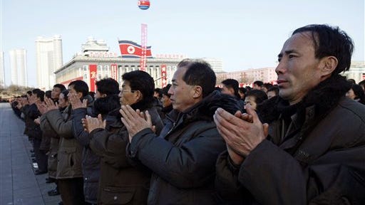 North Koreans clap hands together in a rally, after North Korea said Wednesday it had conducted a hydrogen bomb test, at the Kim Il Sung Square in Pyongyang, Friday, Jan. 8, 2016.  As world leaders debated ways to penalize North Korea's claim of a fourth nuclear test, South Korea voiced its displeasure with broadcasts of anti-Pyongyang propaganda across the rivals' tense border Friday, believed to be the birthday of North Korean leader Kim Jong Un. (AP Photo/Kim Kwang Hyon)