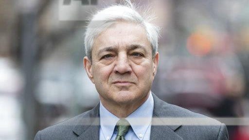 Former Penn State president Graham Spanier walks to the Dauphin County Courthouse in Harrisburg, Pa., Friday, March 24, 2017. Spanier faces charges that he failed to report suspected child sex abuse in the last remaining criminal case in the Jerry Sandusky child molestation scandal. (AP Photo/Matt Rourke)