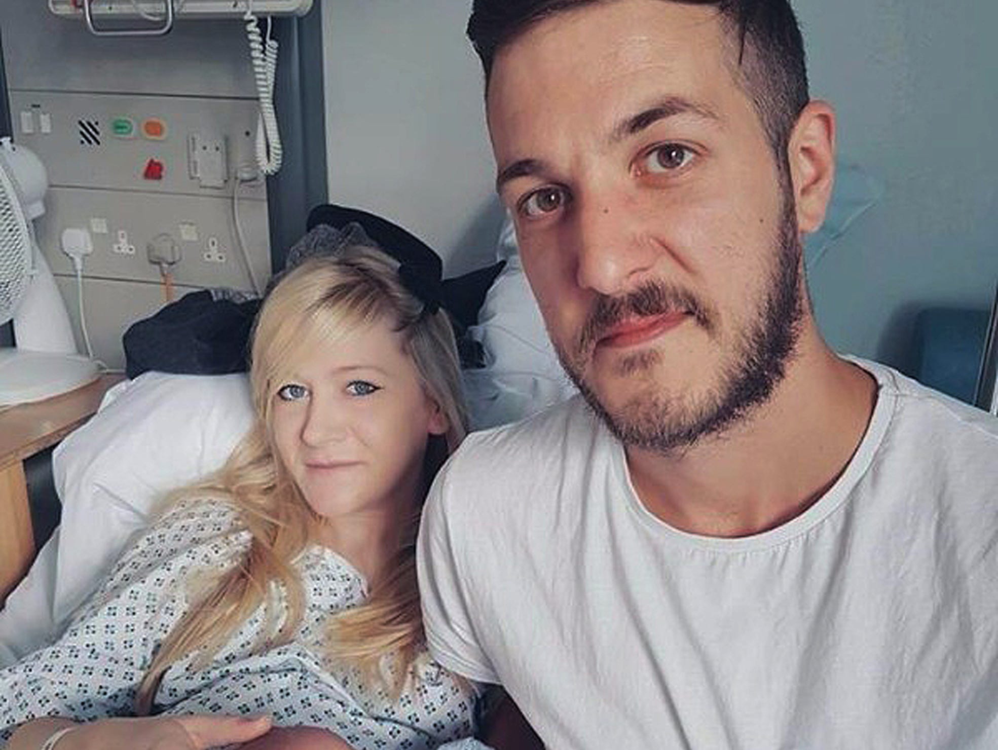 This is an undated hand out photo of Chris Gard and Connie Yates with their son Charlie Gard provided by the family, at Great Ormond Street Hospital, in London.