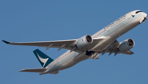 A Cathay Pacific Airbus A350 takes off from Hong Kong