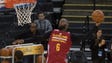 LeBron James dunks during the NBA Finals media day