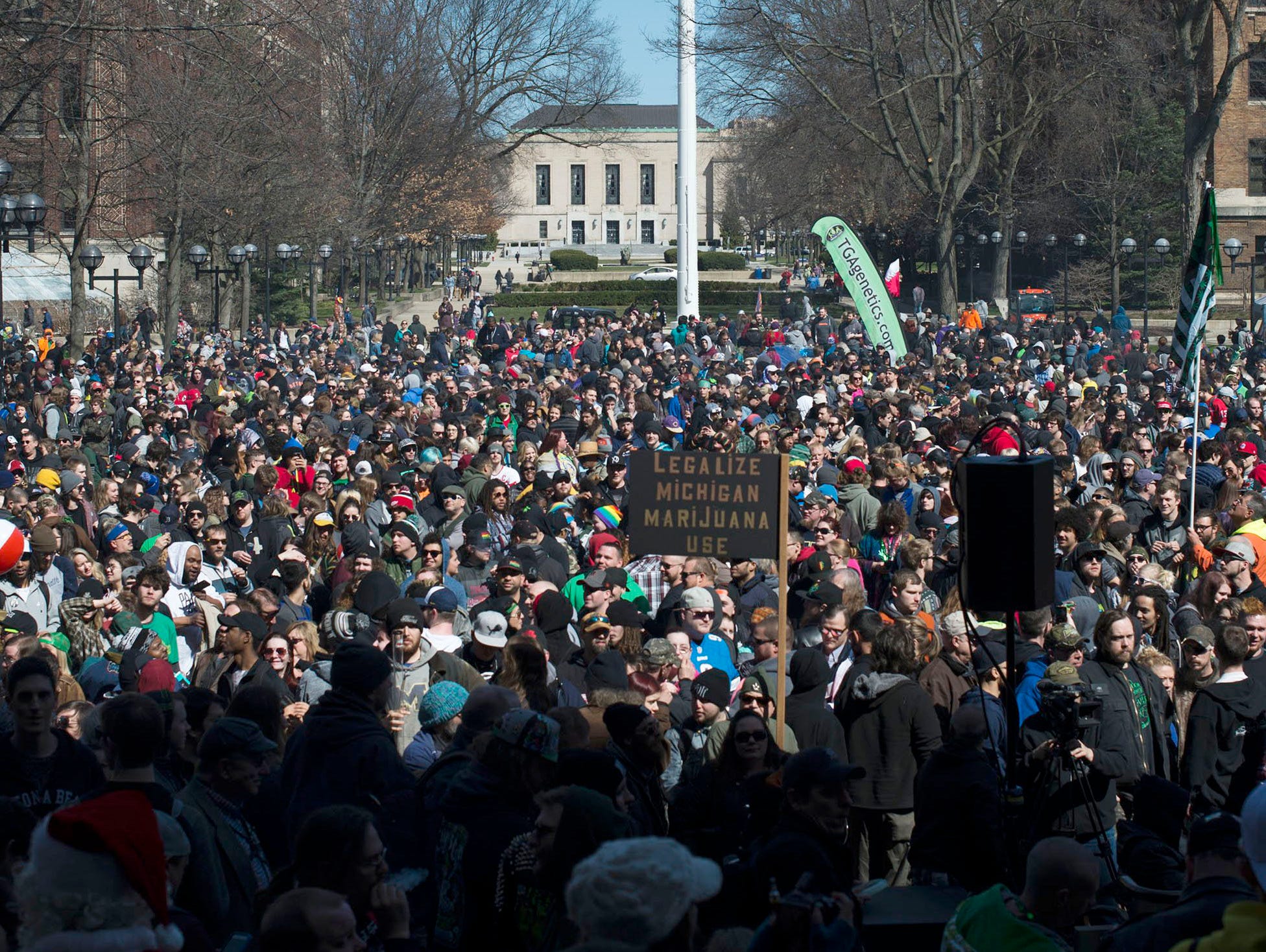 A crowd gathers during Hash Bash on Saturday, April 1, 2017 at the University of Michigan in Ann Arbor. The event brought supporters of marijuana together with shouts of 