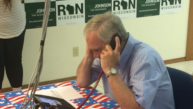 U.S. Sen. Ron Johnson makes campaign phone calls at the Republican Party of Wisconsin's regional field office in Allouez on Tuesday. Johnson is seeking re-election in November.