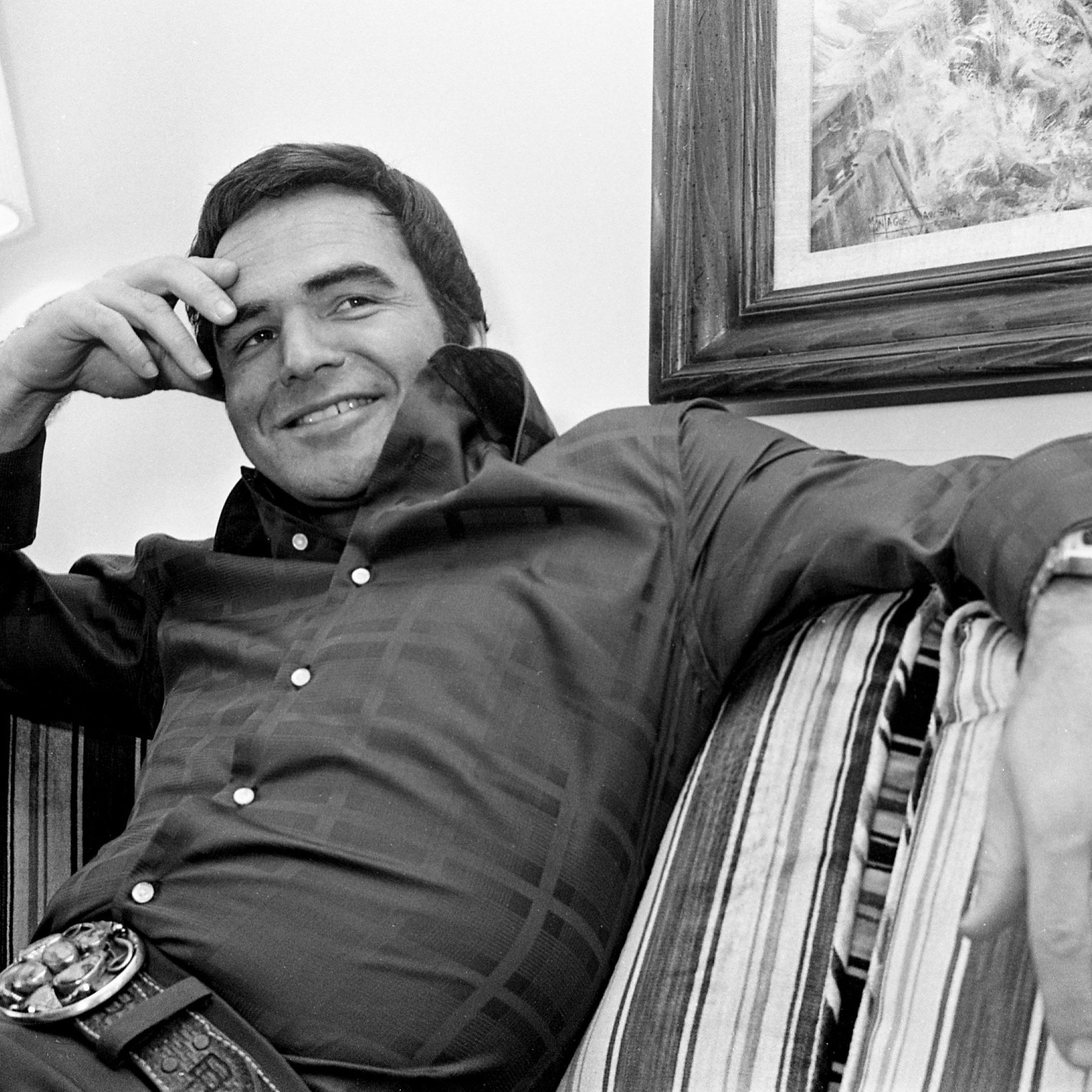 Burt Reynolds, sans mustache, sits for an  interview in this March 3, 1975 photo.