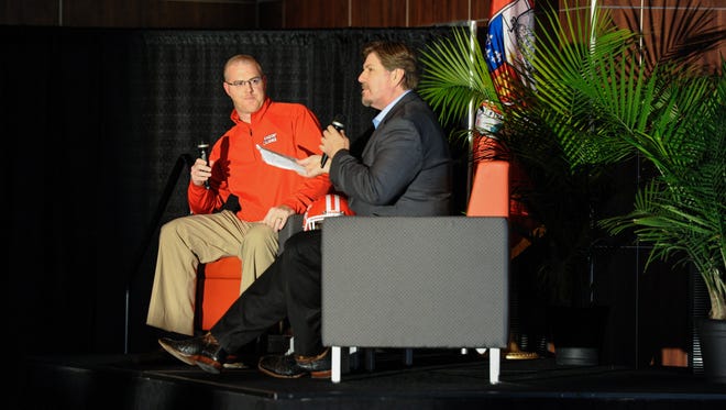 Gerald Broussard, right, talks to then UL recruiting coordinator Reed Stringer during the 2016 UL Football Signing Bash.
