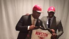 Auburn wide receivers coach Dameyune Craig celebrates with former Florida State quarterback Jameis Winston, who was selected No. 1 in the NFL Draft.