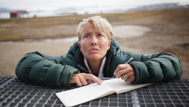 Actress Emma Thompson takes notes at the international scientific research settlement of Ny-Ålesund, Svalbard.  She is in Norway with Greenpeace as part of the Save the Arctic campaign, working for the protection of the Arctic.