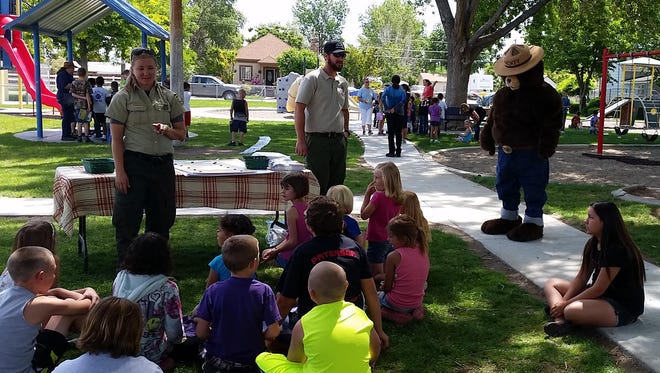 The U.S. Forest Service, joined by Smoky Bear, were among presenters at a conservation/environment workshop for kidss June 9 at the Boys & Girls Clubs of Mason Valley.