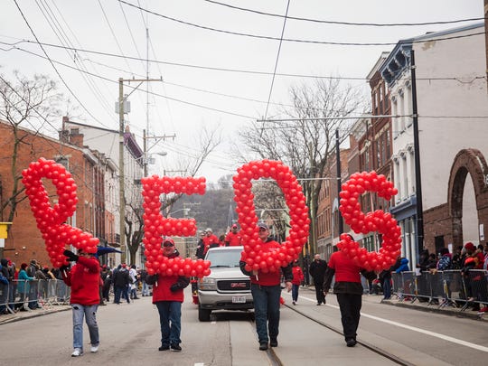 187 units participate in the 99th annual Findlay Market Opening Day Parade before the Cincinnati Reds play the Chicago Cubs in downtown Cincinnati Monday, April 1, 2018.