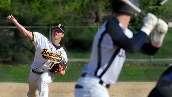 Beacon High School freshman Alex Callaway fires a pitch against Our Lady of Lourdes in Poughkeepsie on Monday.