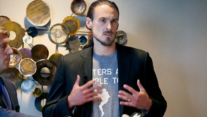 Chris Kluwe speaks during a news conference July 15 in Minneapolis.