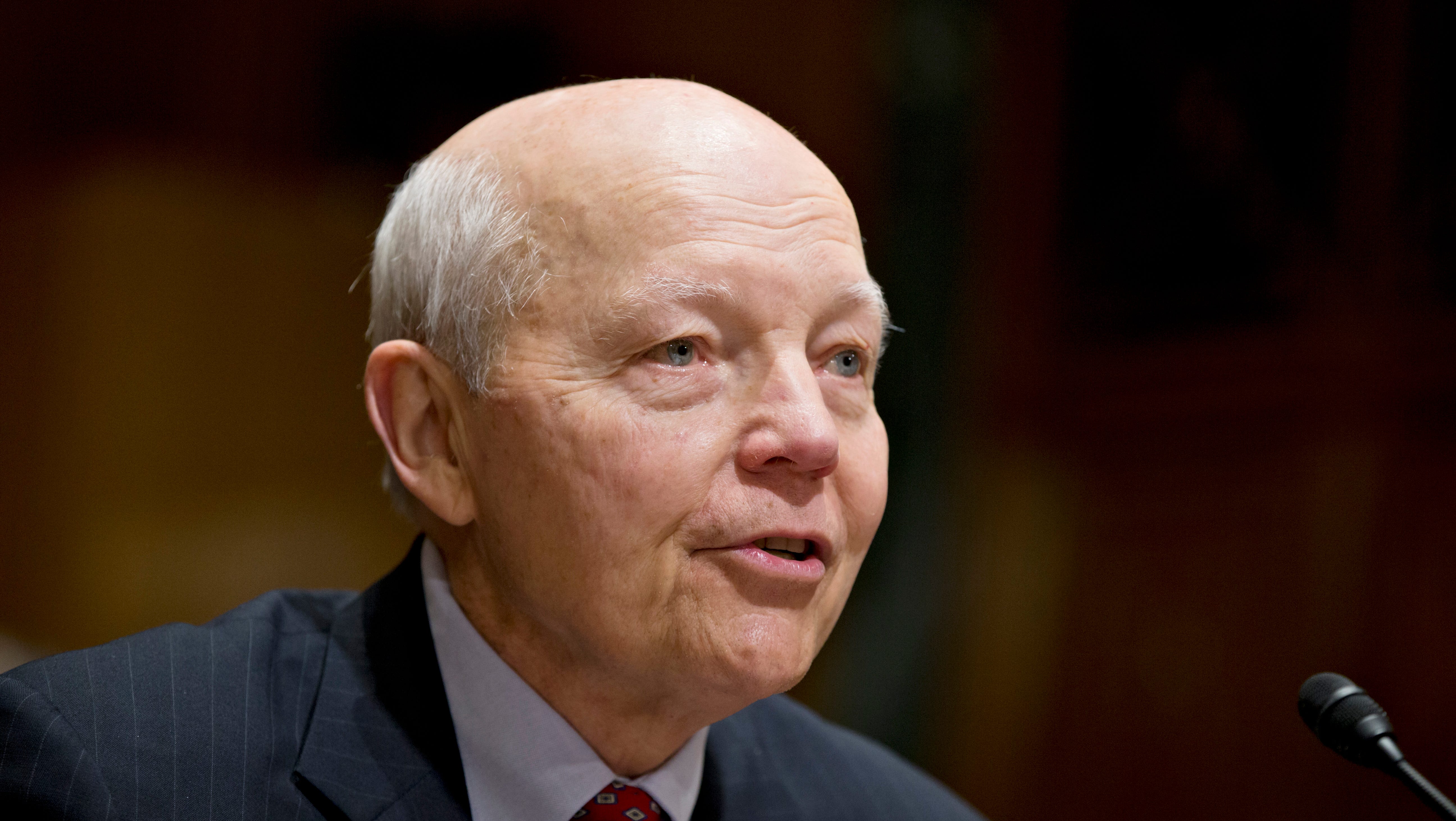 Obama praises new IRS commissioner