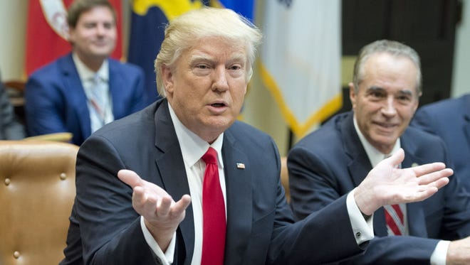 President Trump and Rep. Chris Collins, right, on Feb. 16, 2017.
