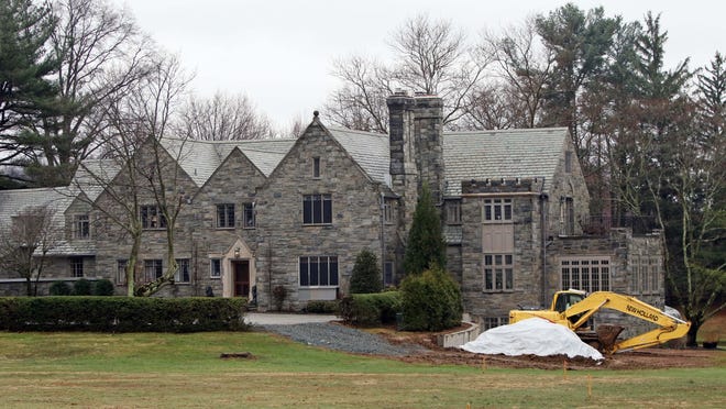 The $5 million former Chateau Country estate of automobile dealer John Hynansky is shown on Wednesday. The home was the subject of a seven-year court battle between two prominent Delaware figures.