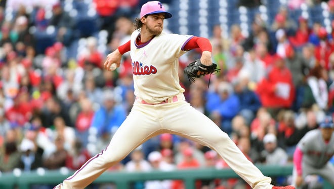Philadelphia Phillies starting pitcher Aaron Nola (27) throws a pitch during the first inning against the New York Mets at Citizens Bank Park.