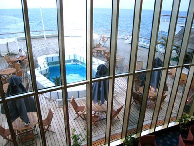 From the Terrace Lounge, there is a dramatic view through the anodized aluminum and glass wall facing the stern.