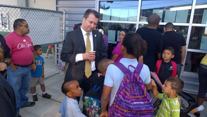 Washoe County School Superintendent Pedro Martinez greets students at Smithridge Elementary School on Monday morning, August 11.