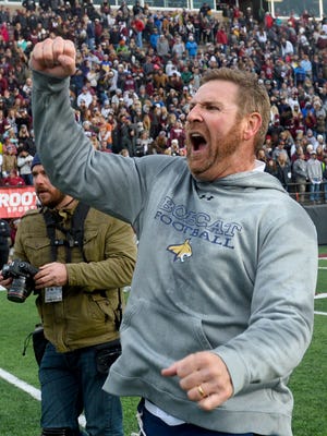 MSU head coach Jeff Choate pumps his fist after the Cats' 24-17 victory over UM in the 2016 Cat-Griz Game in Missoula on Saturday.
