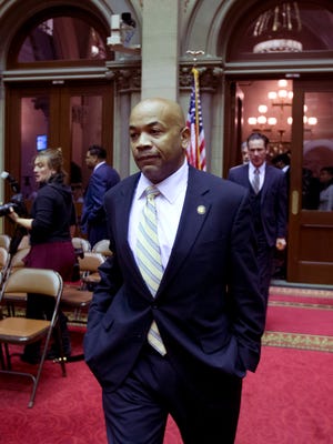 Assemblyman Carl Heastie, D-Bronx, walks through the Assembly Chamber at the Capitol on in Albany.