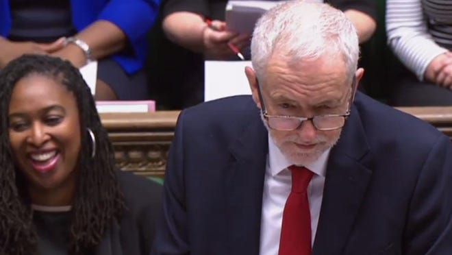 A video grab from footage broadcast by the UK Parliament's Parliamentary Recording Unit (PRU) shows Britain's opposition Labour party leader Jeremy Corbyn takes part in the weekly Prime Minister's Questions (PMQs) in the House of Commons in London on January 30, 2019.