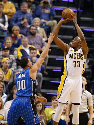 Indiana Pacers center Myles Turner (33) takes a shot  against Orlando Magic forward Aaron Gordon (00) at Bankers Life Fieldhouse.