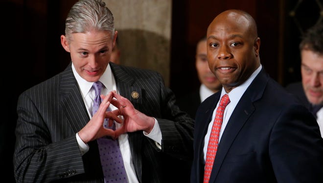 Rep. Trey Gowdy, R-S.C., left, and Sen. Tim Scott, R-S.C., arrive for President Barack Obama's State of the Union address on Capitol Hill in Washington, Tuesday Jan. 28, 2014.