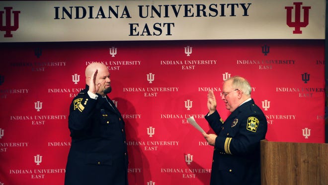 Indiana University East's new police chief Scott Dunning is sworn in by Robert True, interim superintendent of public Safety, chief of police IUPD-IUPUI.