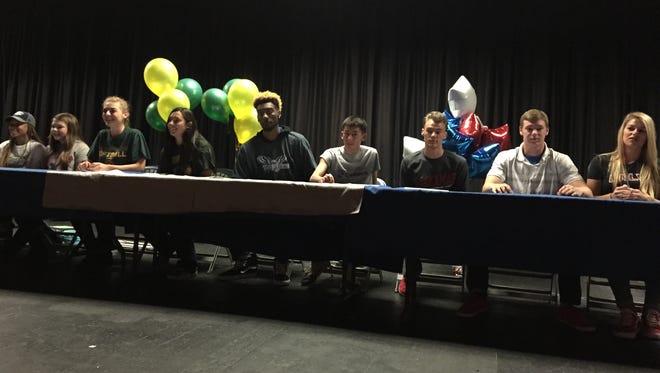 McQueen had nine athletes sign letters of intent Friday in a ceremony at the school.
