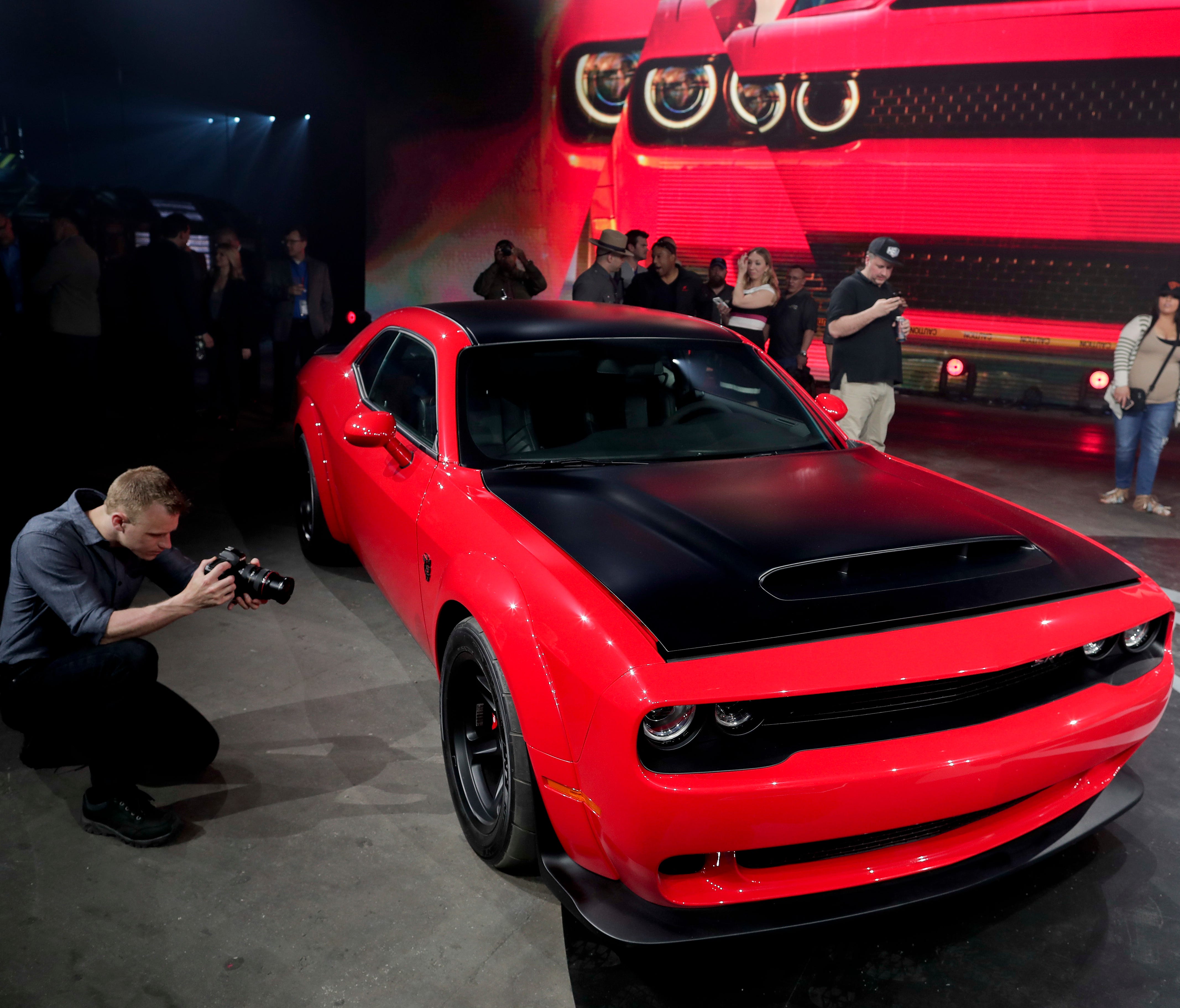 The 2018 Dodge Challenger SRT Demon looks even hotter with a black hood and roof and a red body as seen at the New York International Auto Show last year