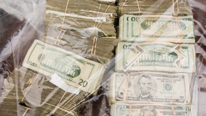 Bags of cash seized from an alleged meth organization that was broken up by Phoenix Police.