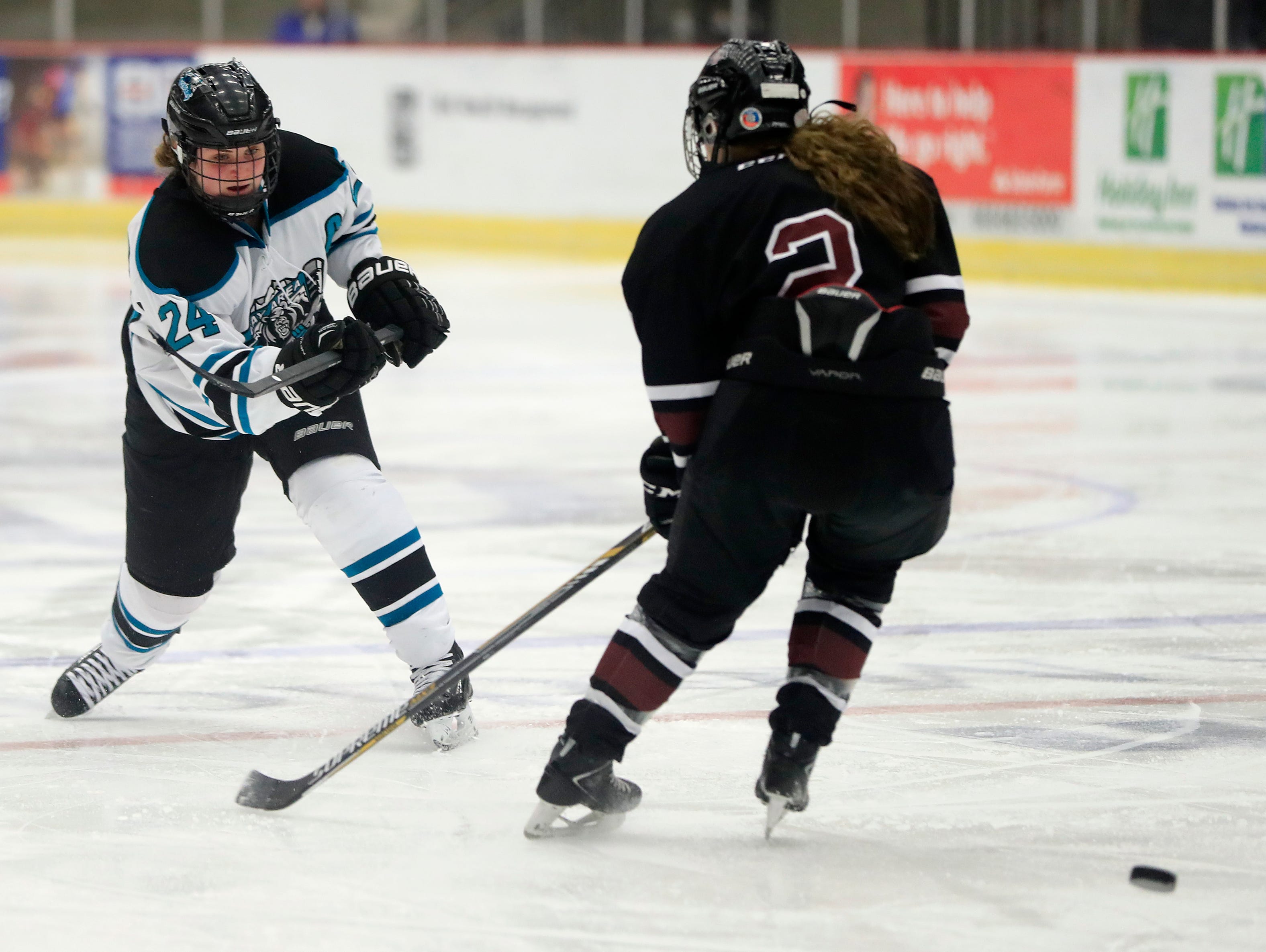 Bay Area Ice Bears defenseman Mia Dunning (24) shoots against the Central Wisconsin Storm in the championship match at the 2017 State Hockey Tournament at Veterans Memorial Coliseum on Saturday, March 4, 2017, in Madison, Wis. The Storm won the match 2-1 in overtime. Adam Wesley/USA TODAY NETWORK-Wisconsin
